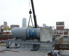 Rooftop installation of fan and outlet silencer. 