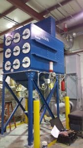 Explosion suppression system on a Donaldson cartridge dust collector.
