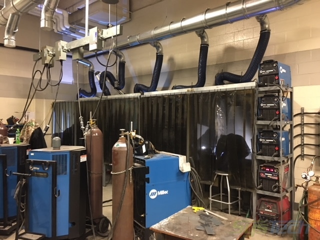 Weld smoke exhaust system for a technical training school