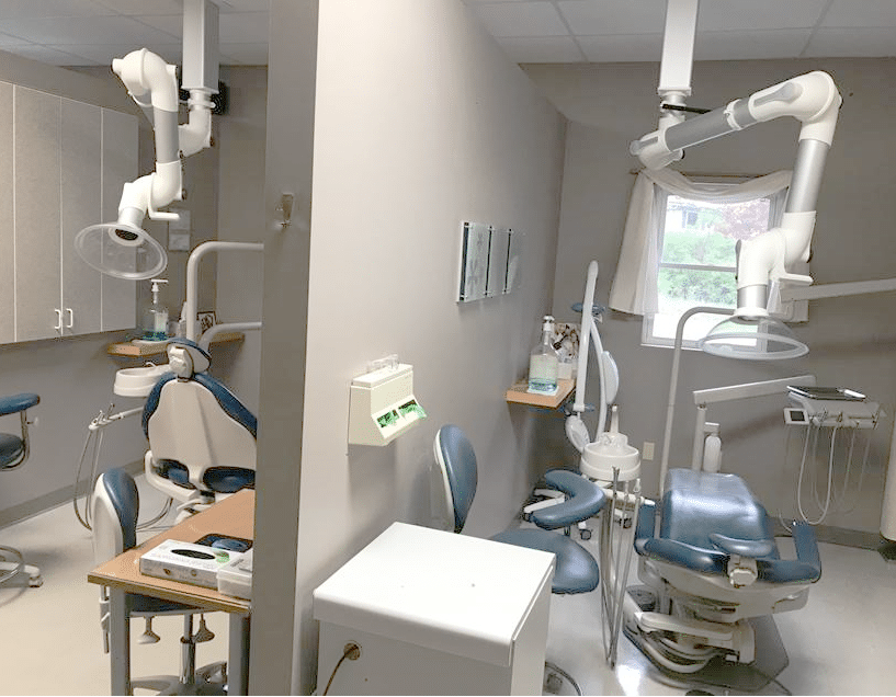 Laboratory Extraction Arm modified for dental offices.