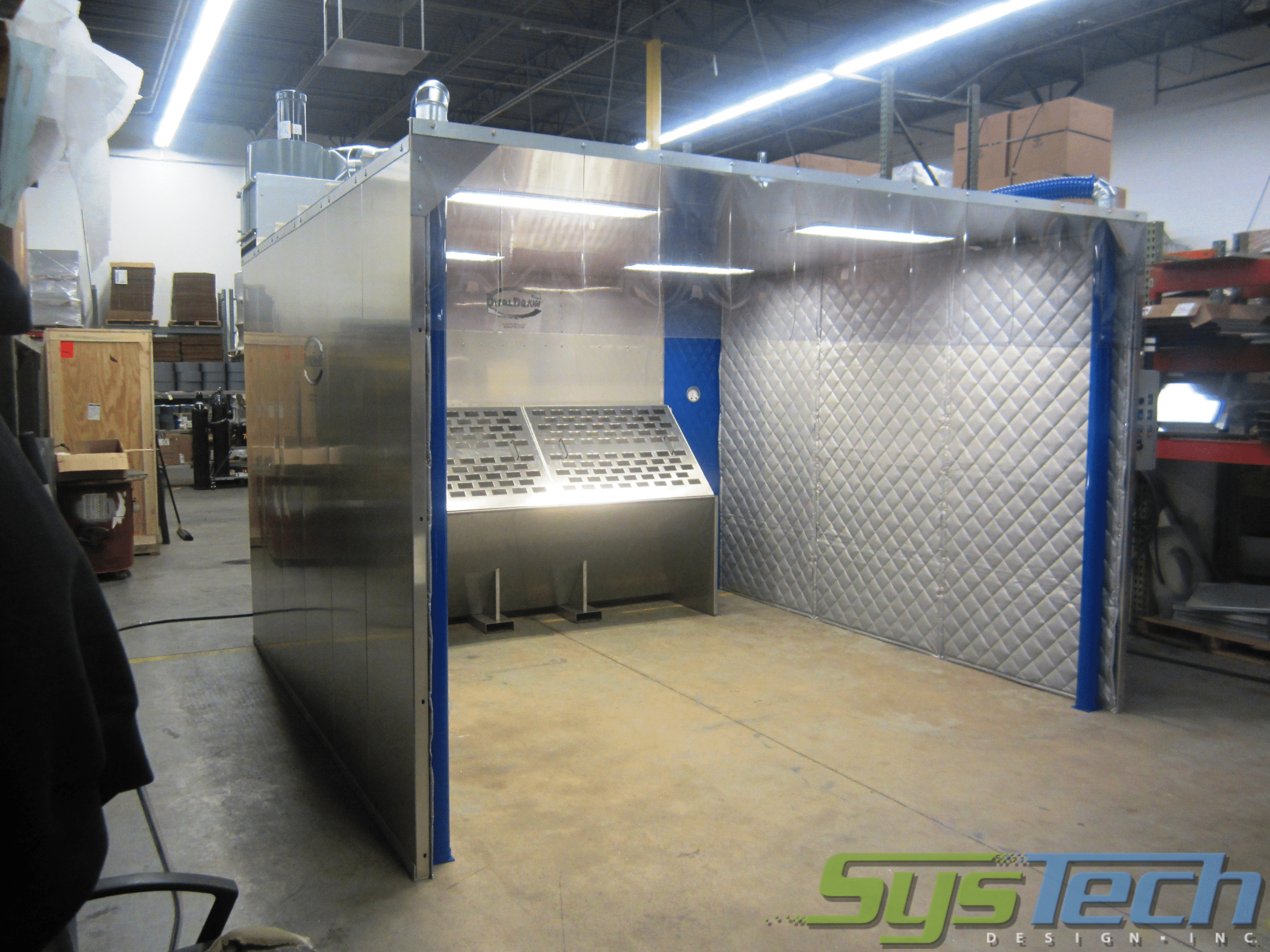 Dust Control Booth with a Wet Scrubber on the back wall