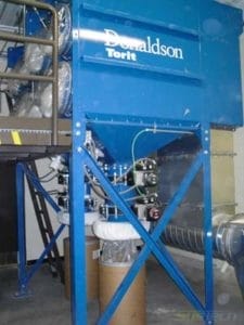 Containment Dust Collector with bag in-bag out features on cartridge access ports and hopper discharge, with continuous liner and pneumatically operated double dump valves. Collector is a Donaldson Torit Model DFT 3-24 applied to pharmaceutical dusts.